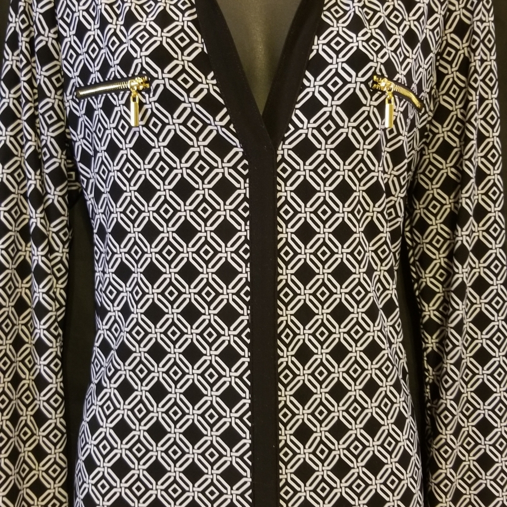 INC BLACK AND WHITE  V NECK BLOUSE